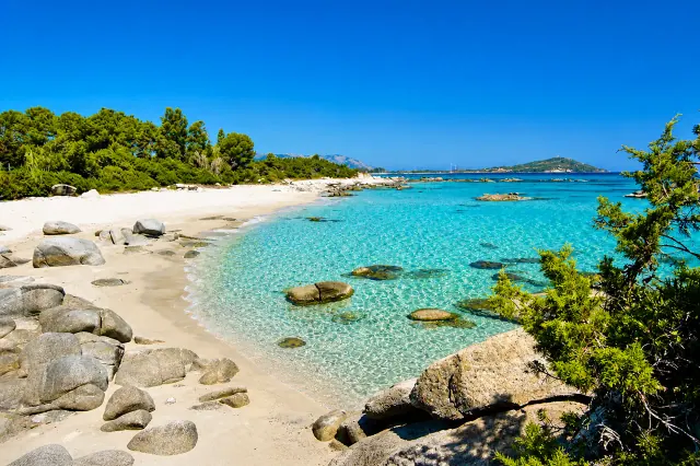 Cala Ginepro, Orosei — sabbia chiara, ginepri sul mare e acqua turchese cristallina